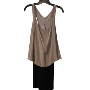 Stylish Beige Sleeveless Top with Black Skirt
